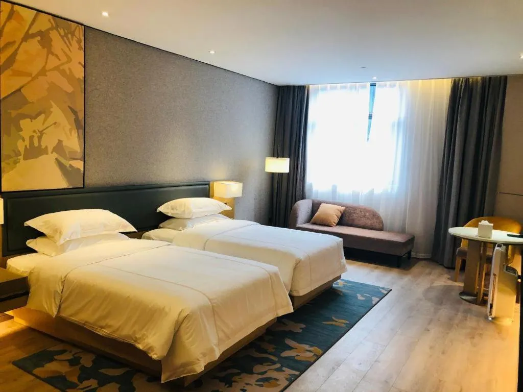 Bed in The Hotel V Nanjing Lishui