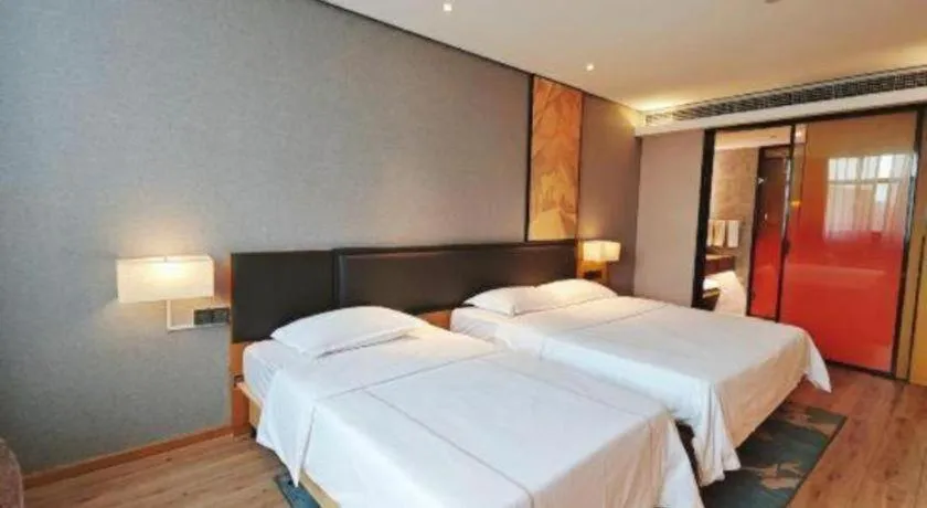 Bed in The Hotel V Nanjing Lishui