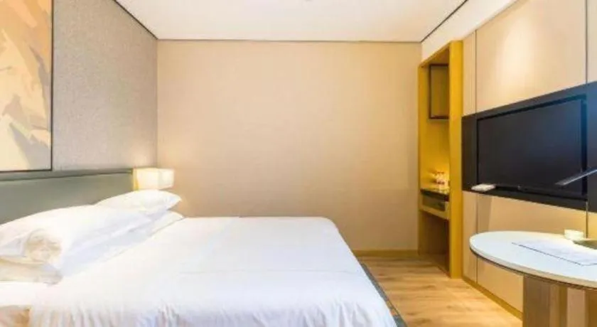 Bed in The Hotel V Nanjing Lishui