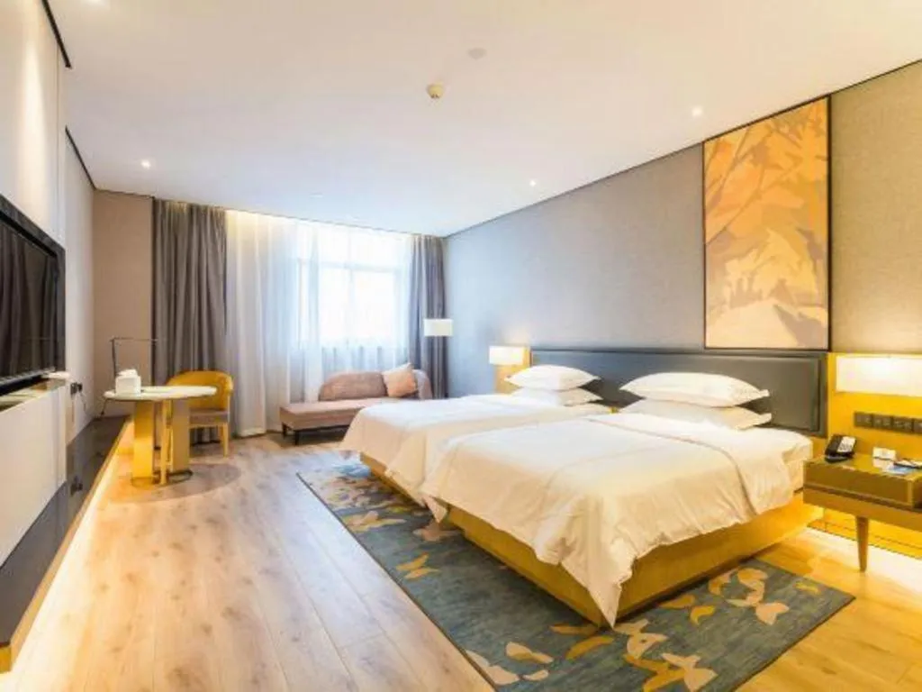 Bed in The Hotel V Nanjing Lishui