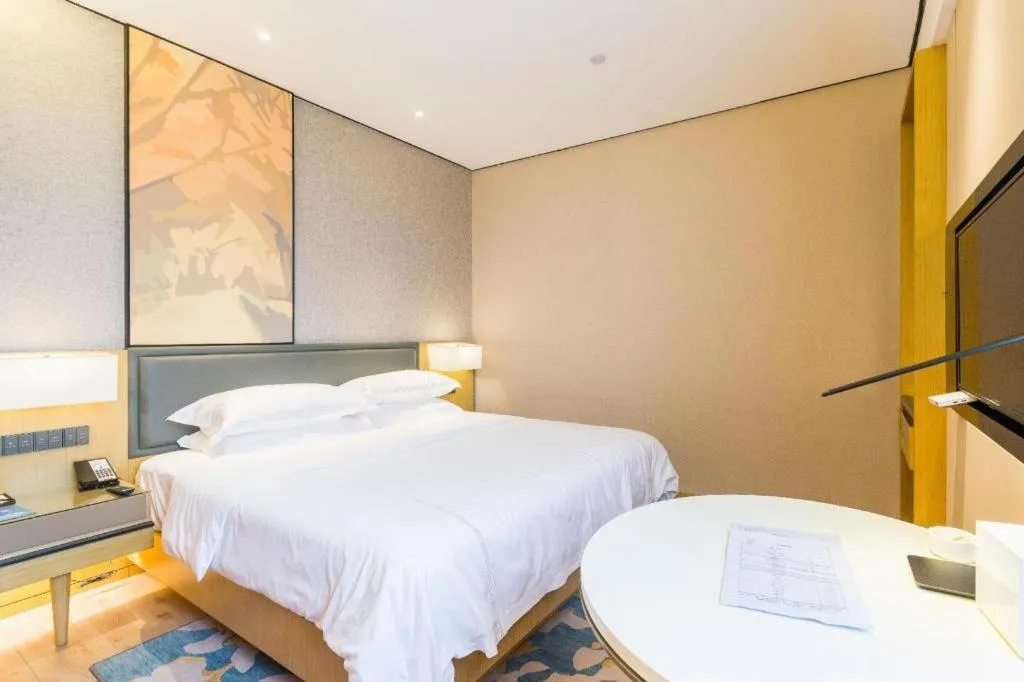 Bed in The Hotel V Nanjing Lishui