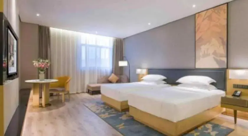 Bed in The Hotel V Nanjing Lishui Bed in The Hotel V Nanjing Lishui