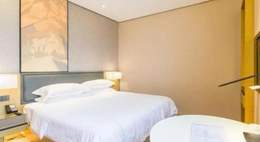 Bed in The Hotel V Nanjing Lishui