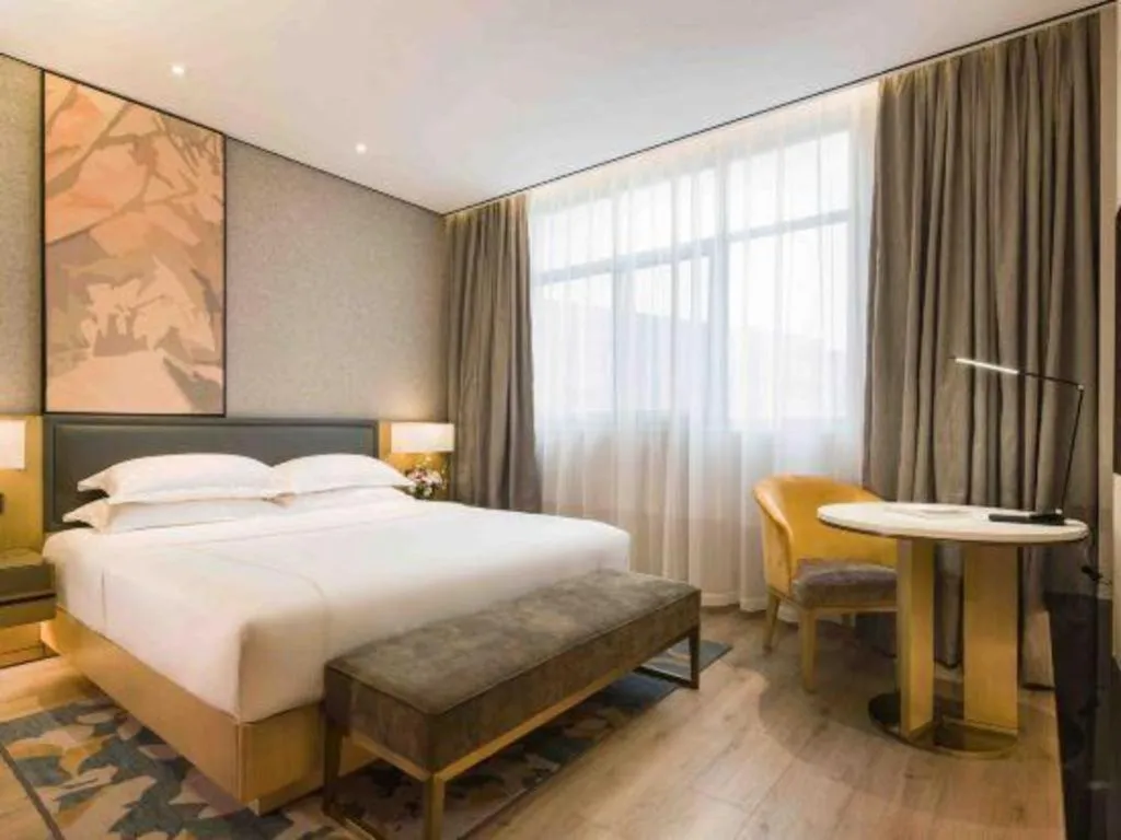 Bed in The Hotel V Nanjing Lishui