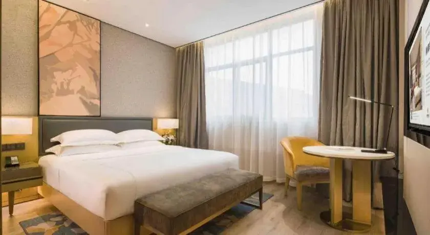 Bed in The Hotel V Nanjing Lishui Bed in The Hotel V Nanjing Lishui