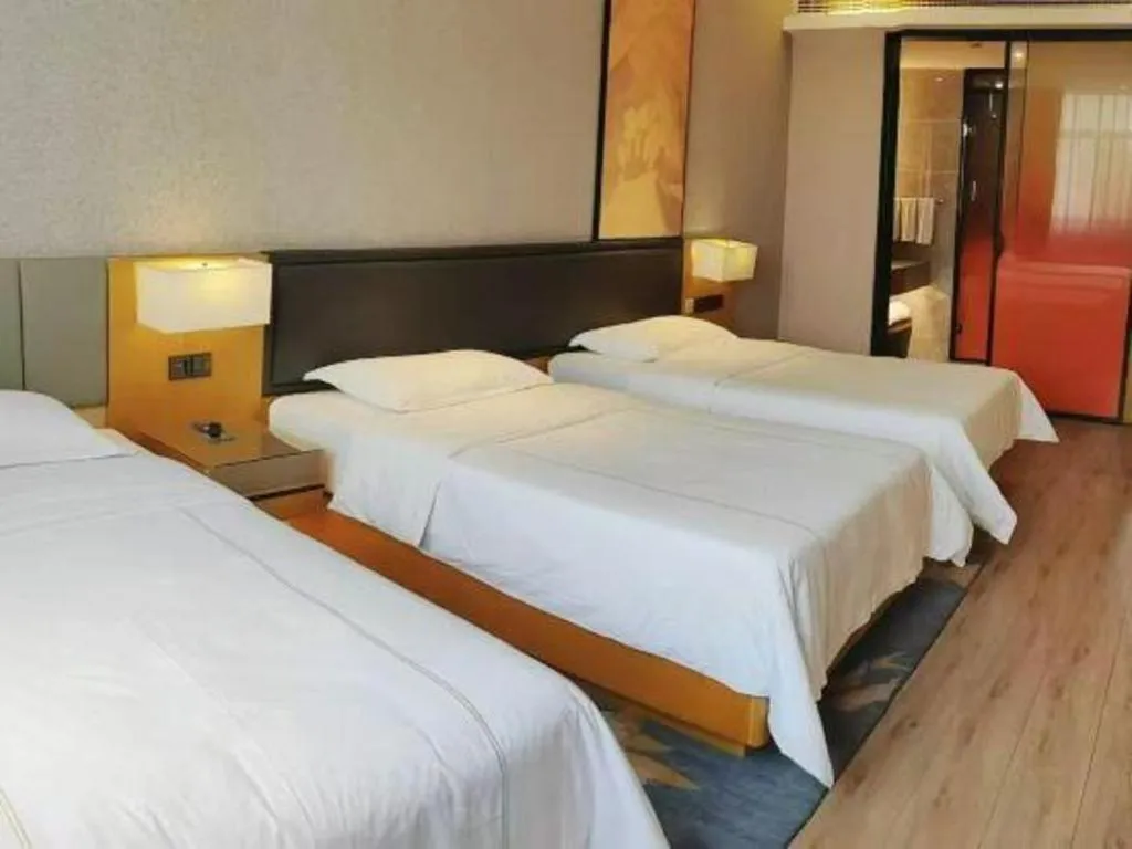 Bed in The Hotel V Nanjing Lishui