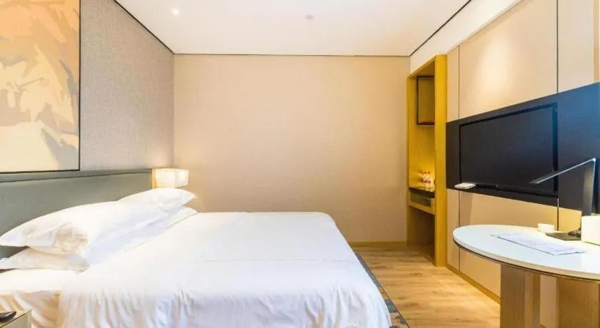 Bed in The Hotel V Nanjing Lishui