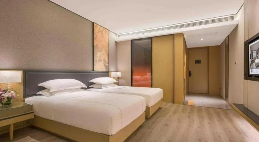 Bed in The Hotel V Nanjing Lishui