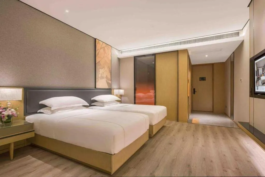 Bed in The Hotel V Nanjing Lishui