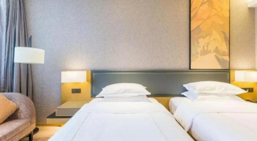 Bed in The Hotel V Nanjing Lishui