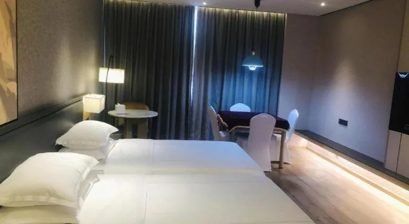 Bed in The Hotel V Nanjing Lishui