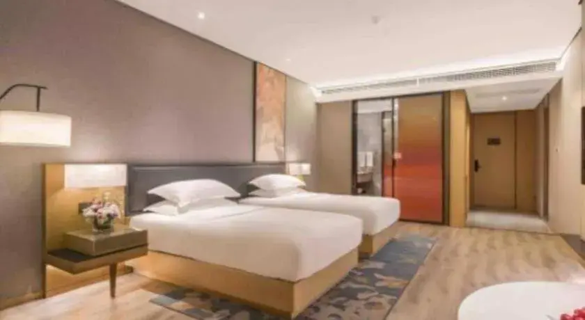 Bed in The Hotel V Nanjing Lishui Bed in The Hotel V Nanjing Lishui