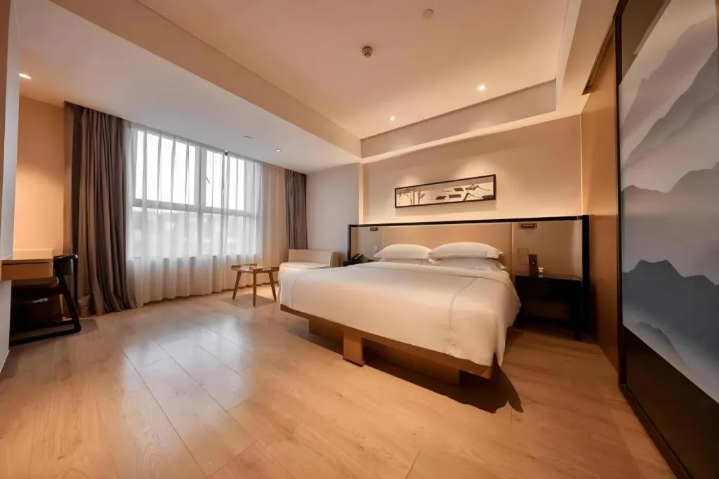 Bed in The Hotel V Nanjing Confucius Temple