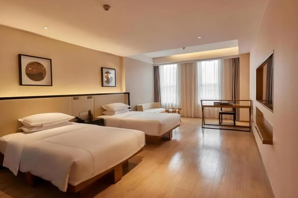 Bed in The Hotel V Nanjing Confucius Temple