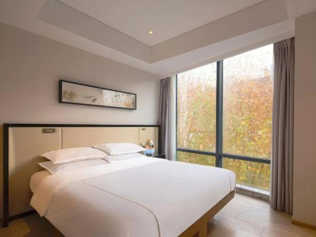 Bed in The Hotel V Nanjing Confucius Temple