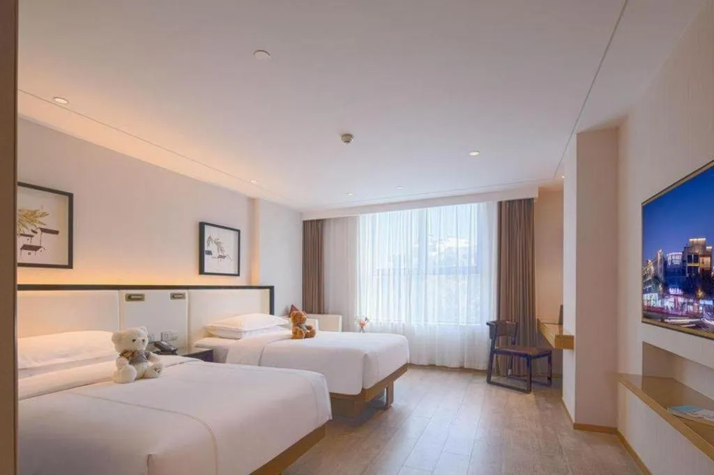 Bed in The Hotel V Nanjing Confucius Temple