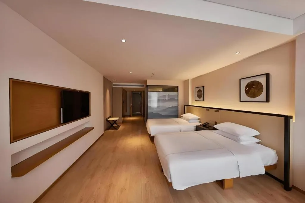 Bed in The Hotel V Nanjing Confucius Temple