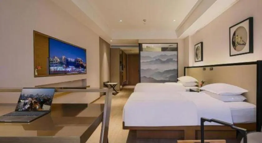 Bed in The Hotel V Nanjing Confucius Temple