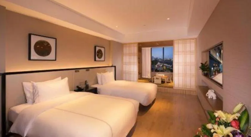 Bed in The Hotel V Nanjing Confucius Temple