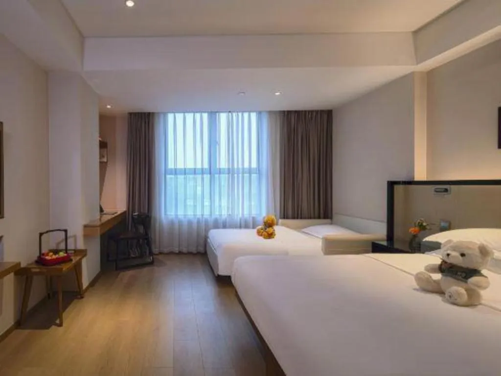 Bed in The Hotel V Nanjing Confucius Temple