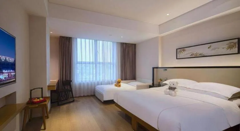 Bed in The Hotel V Nanjing Confucius Temple