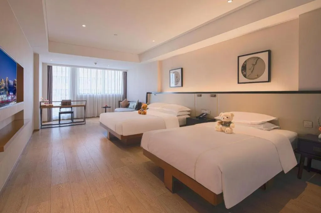 Bed in The Hotel V Nanjing Confucius Temple