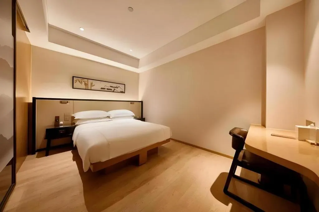 Bed in The Hotel V Nanjing Confucius Temple