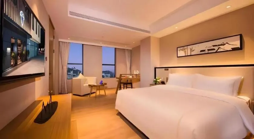 Bed in The Hotel V Nanjing Confucius Temple