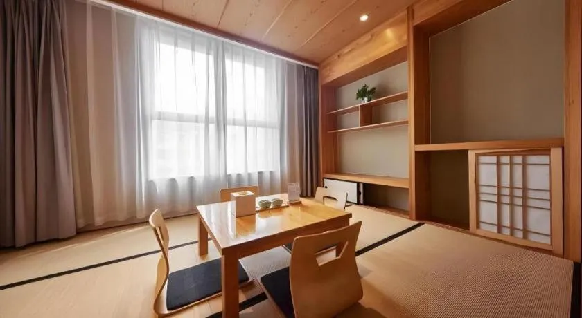 Bed in The Hotel V Nanjing Confucius Temple