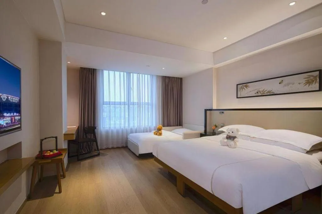 Bed in The Hotel V Nanjing Confucius Temple