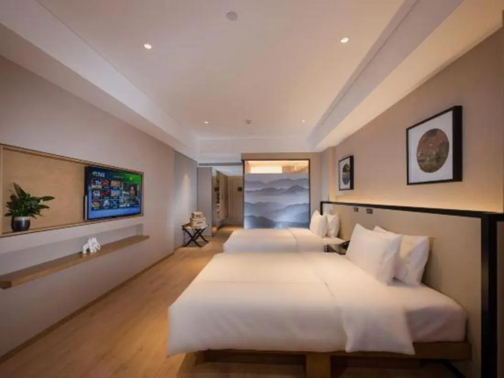 Bed in The Hotel V Nanjing Confucius Temple