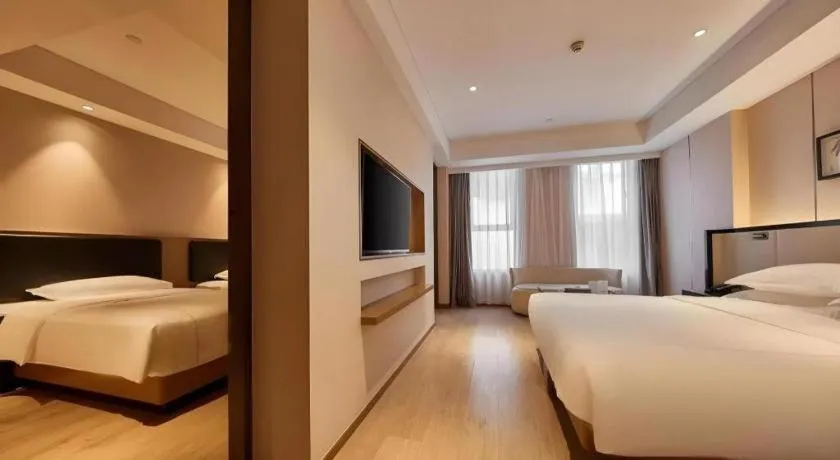 Bed in The Hotel V Nanjing Confucius Temple