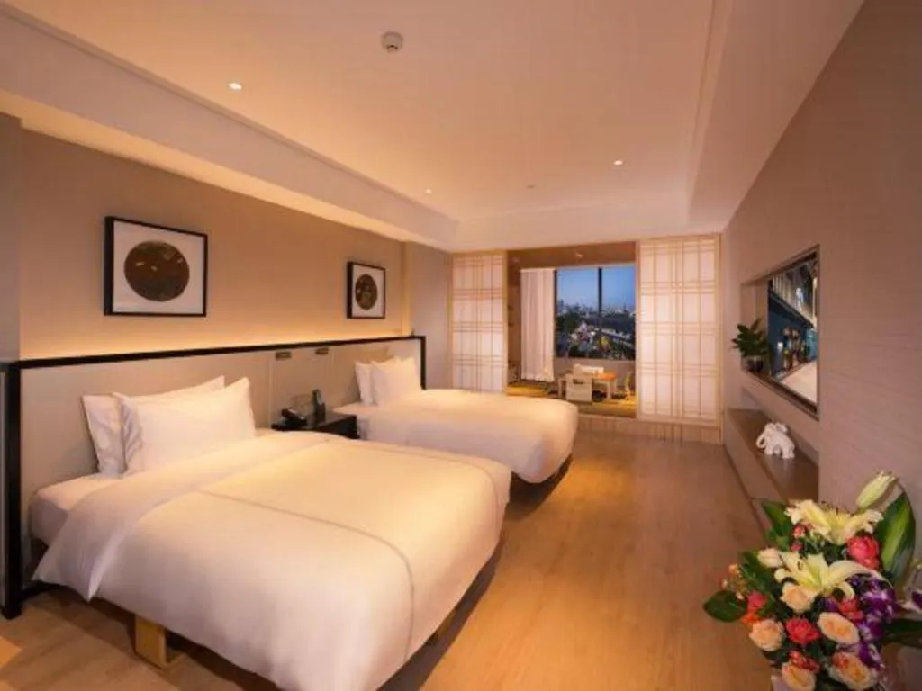 Bed in The Hotel V Nanjing Confucius Temple