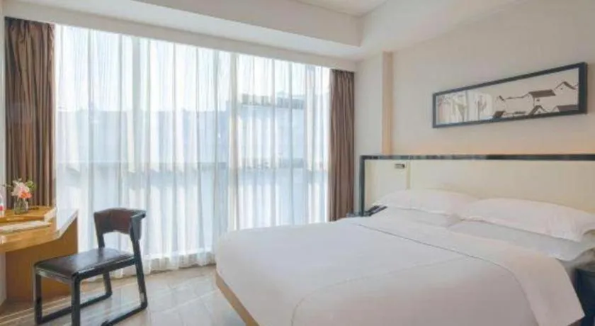 Bed in The Hotel V Nanjing Confucius Temple