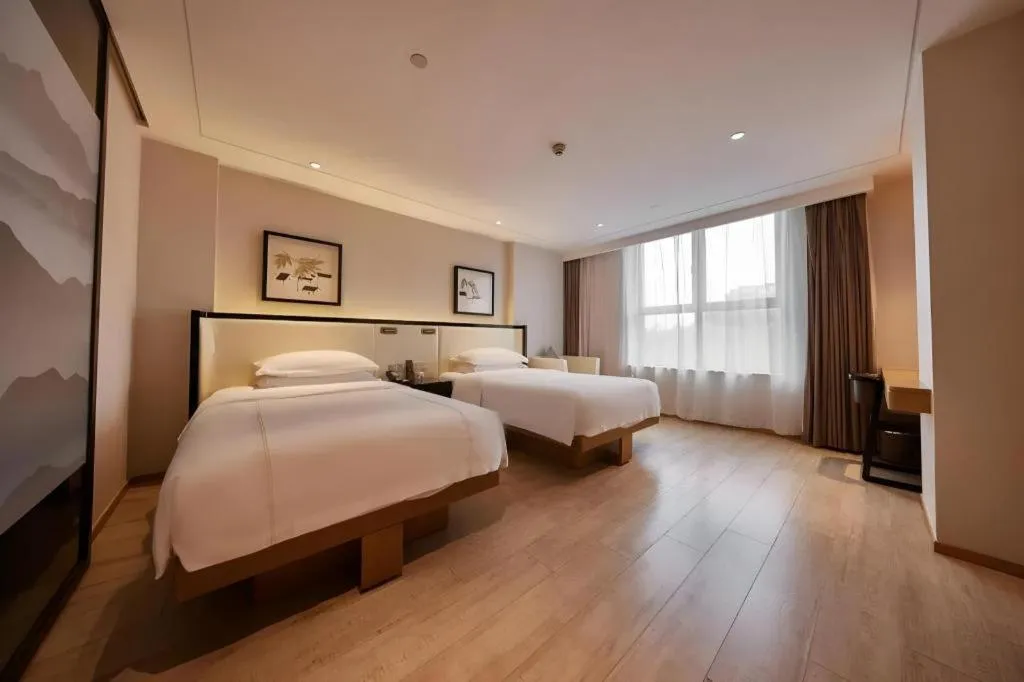 Bed in The Hotel V Nanjing Confucius Temple