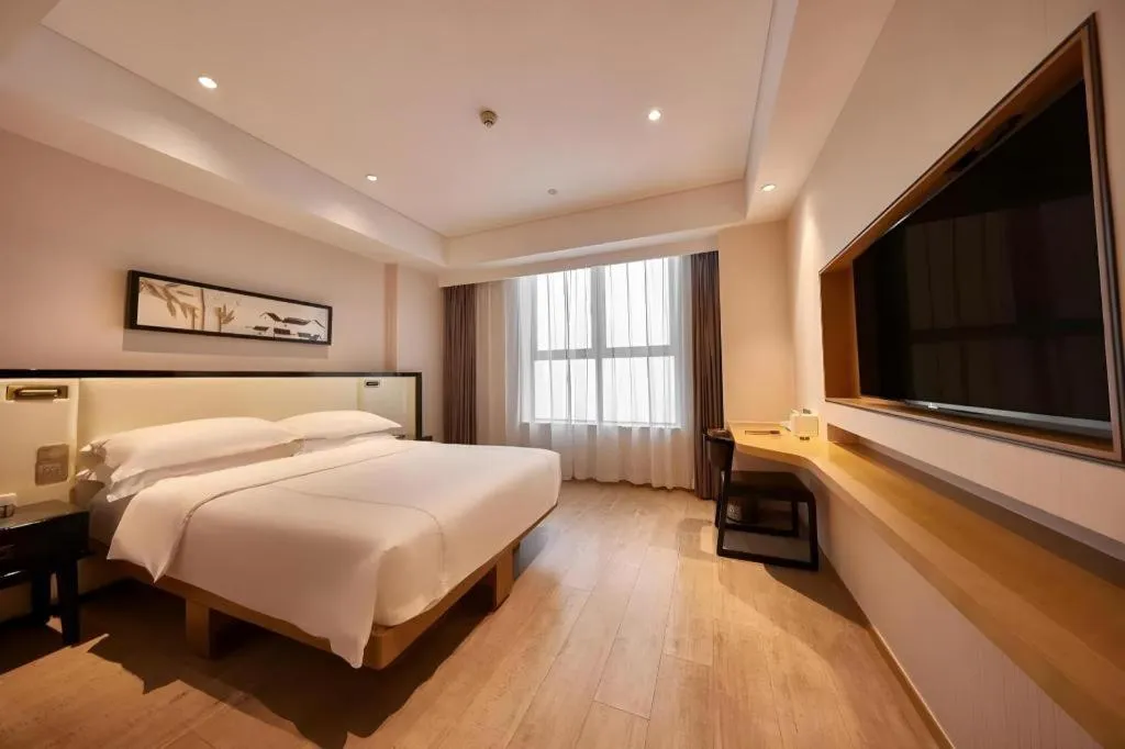 Bed in The Hotel V Nanjing Confucius Temple