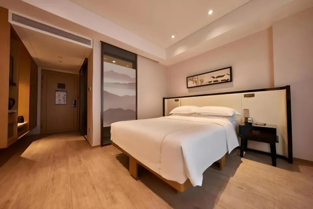 Bed in The Hotel V Nanjing Confucius Temple