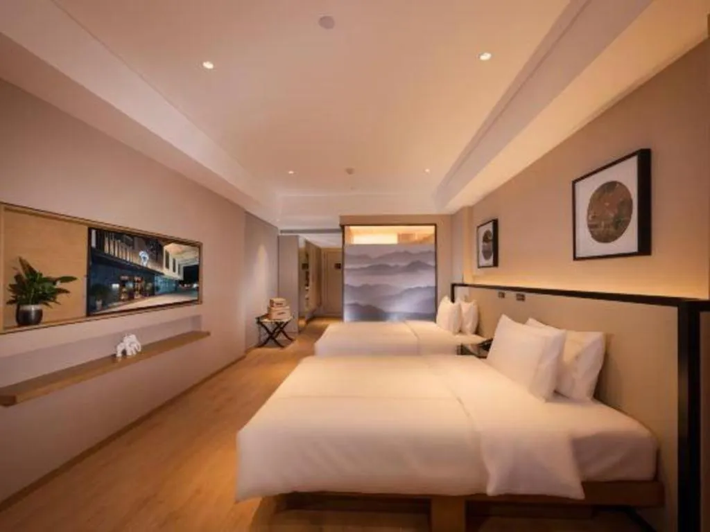 Bed in The Hotel V Nanjing Confucius Temple