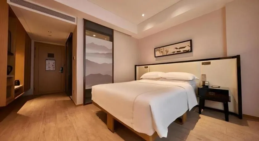 Bed in The Hotel V Nanjing Confucius Temple