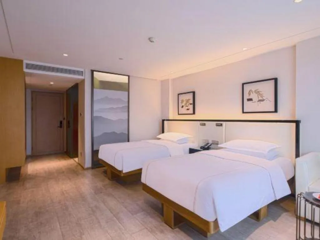 Bed in The Hotel V Nanjing Confucius Temple