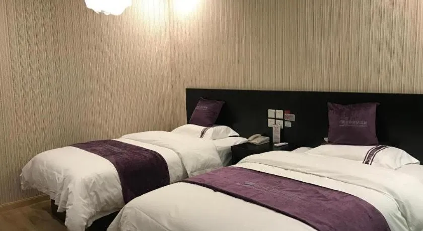 Bed in City 118 Hotel Qingdao Boardcast Tower