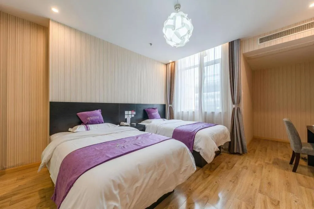 Bed in City 118 Hotel Qingdao Boardcast Tower