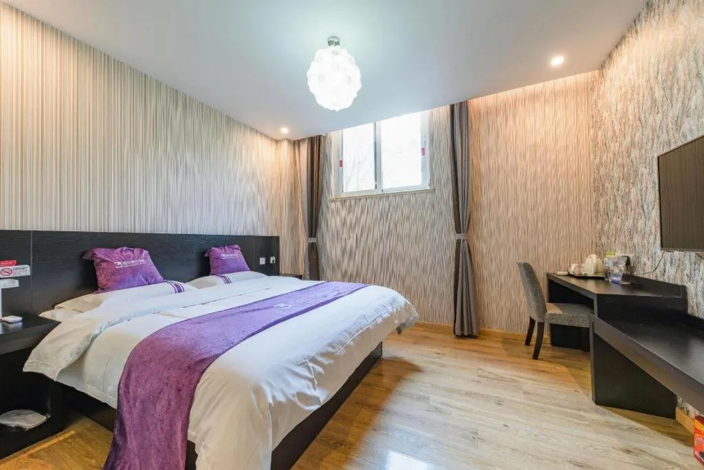 Bed in City 118 Hotel Qingdao Boardcast Tower