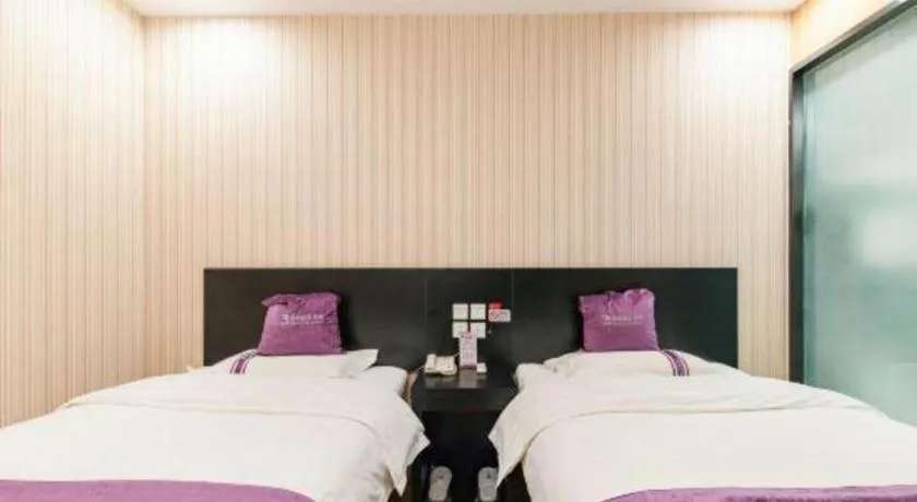 Bed in City 118 Hotel Qingdao Boardcast Tower