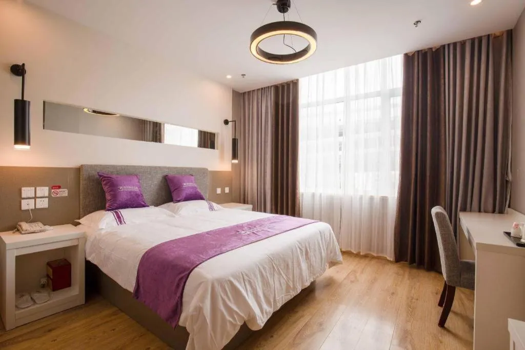 Bed in City 118 Hotel Qingdao Boardcast Tower