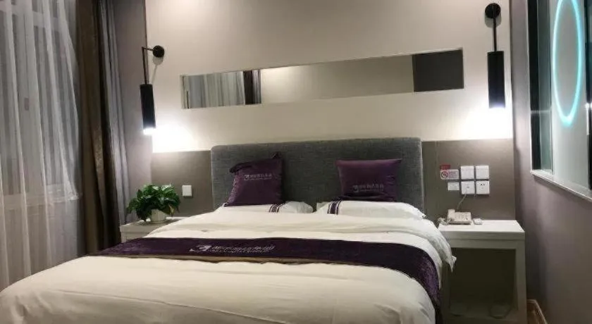 Bed in City 118 Hotel Qingdao Boardcast Tower
