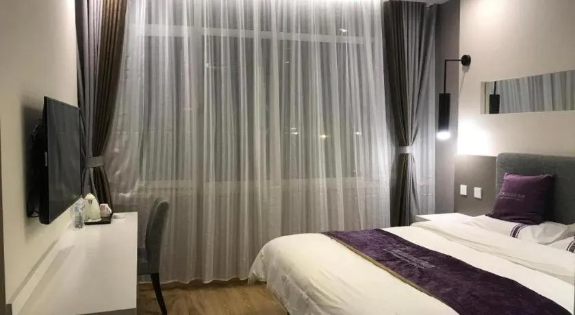 Bed in City 118 Hotel Qingdao Boardcast Tower
