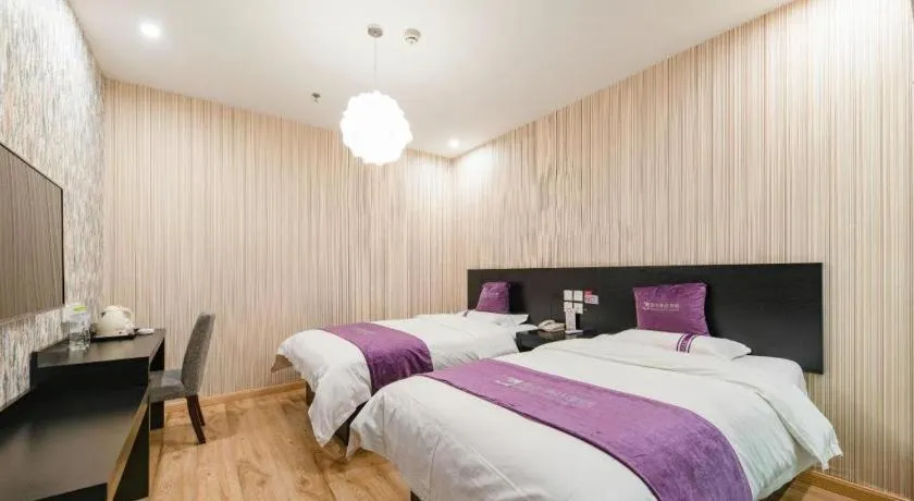 Bed in City 118 Hotel Qingdao Boardcast Tower