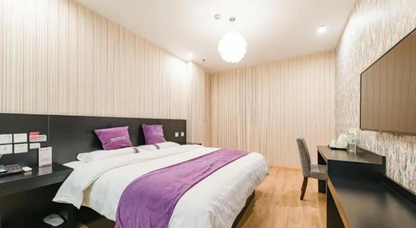 Bed in City 118 Hotel Qingdao Boardcast Tower