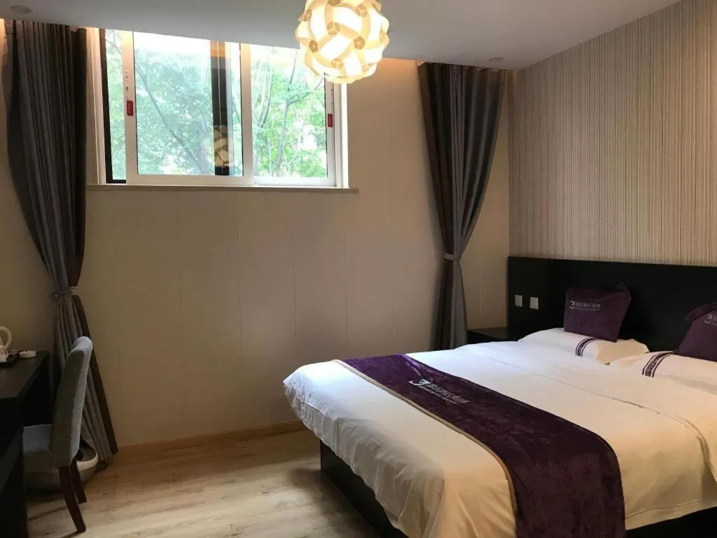 Bed in City 118 Hotel Qingdao Boardcast Tower